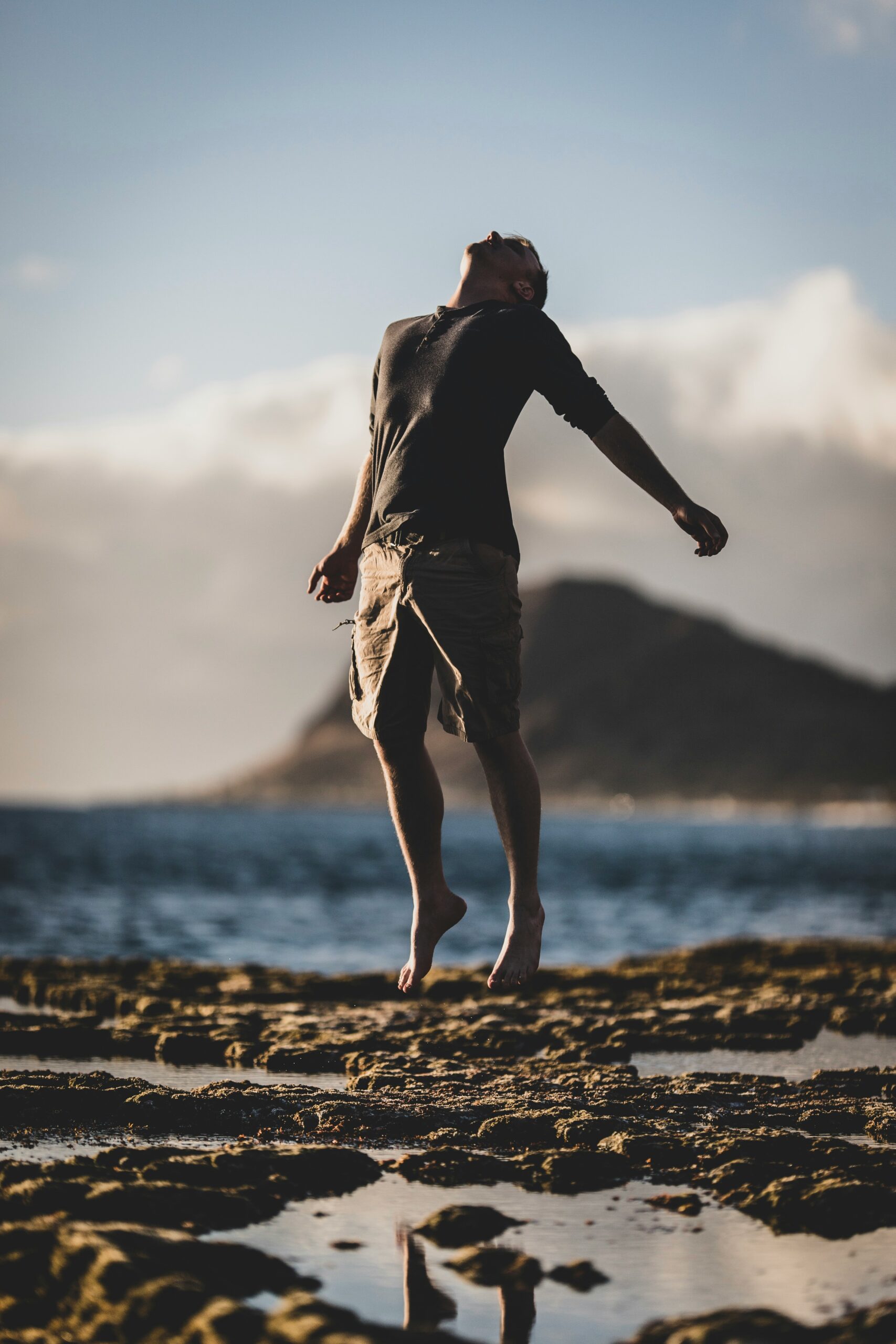 man standing near seashore , self confidence and overcome challenges