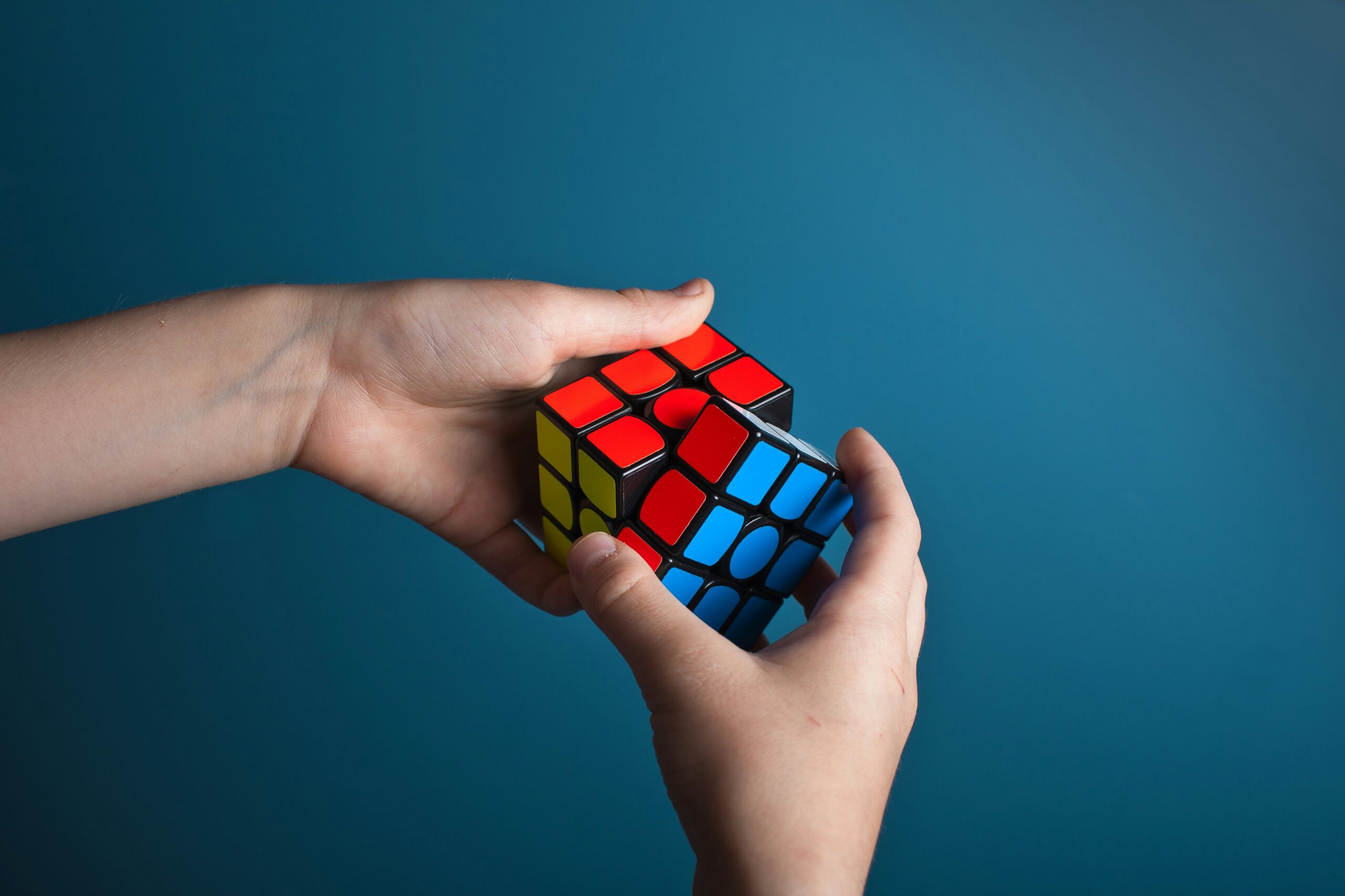 Overcoming Life's Challenges | Resilience Tips , person playing magic cube